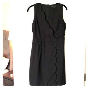 Black dress with scallop detail
